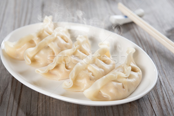 Asian gourmet dumplings Stock photo © szefei