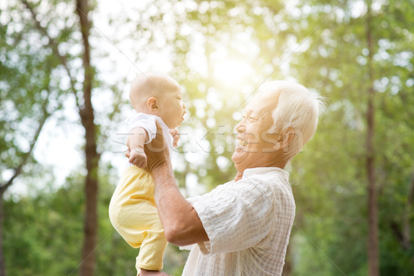 Grand-parent jouer petit-enfant bébé petit-fils grand-père [[stock_photo]] © szefei