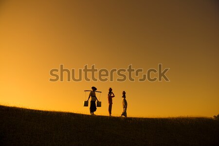 Silhouette of group Asian traditional farmers Stock photo © szefei