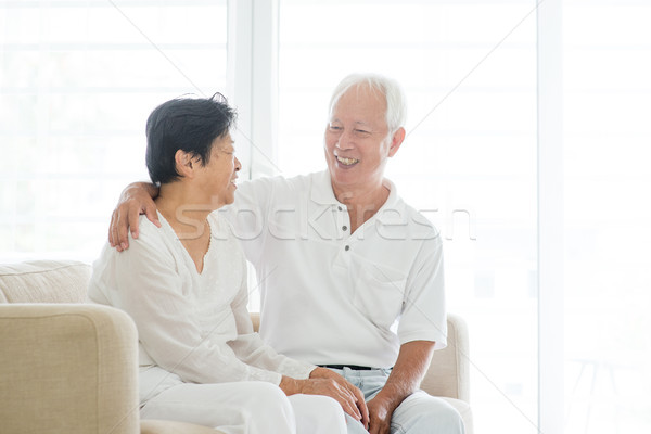 Old couple at home Stock photo © szefei