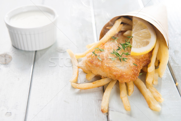 Fish and chips wrapped in cone Stock photo © szefei