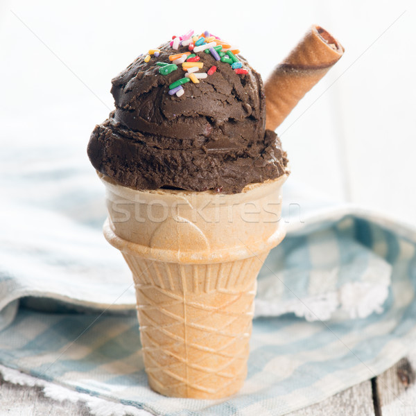 Brown ice cream in waffle cone  Stock photo © szefei