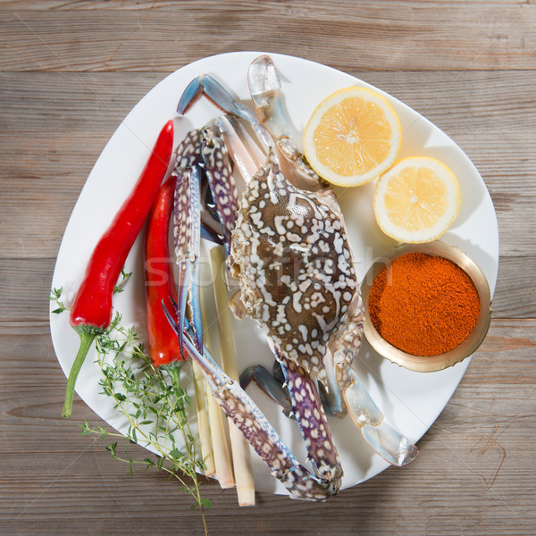 Raw blue crab and ingredients ready to cook Stock photo © szefei