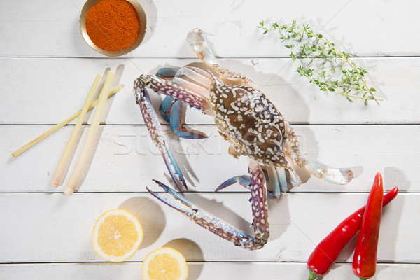Top view raw blue crab and ingredients Stock photo © szefei