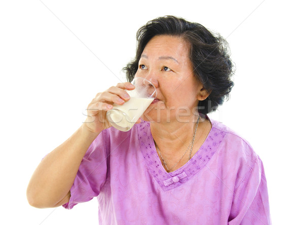 Stock photo: Drinking soy milk