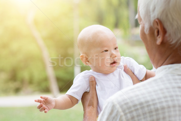 Grandfather and grandson. Stock photo © szefei