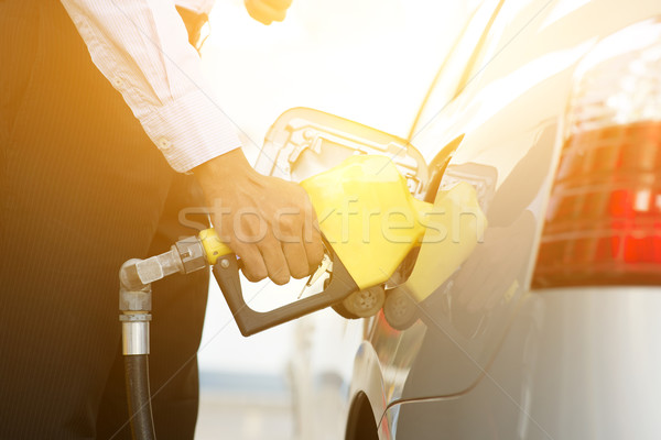 Benzyny paliwa człowiek biznesu samochodu stacji benzynowej Zdjęcia stock © szefei