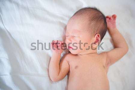 ázsiai új született baba fiú alszik Stock fotó © szefei