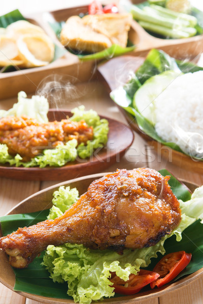 Delicious Asian food nasi ayam penyet Stock photo © szefei