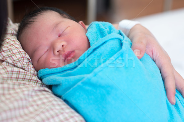 Newborn baby girl and mother Stock photo © szefei