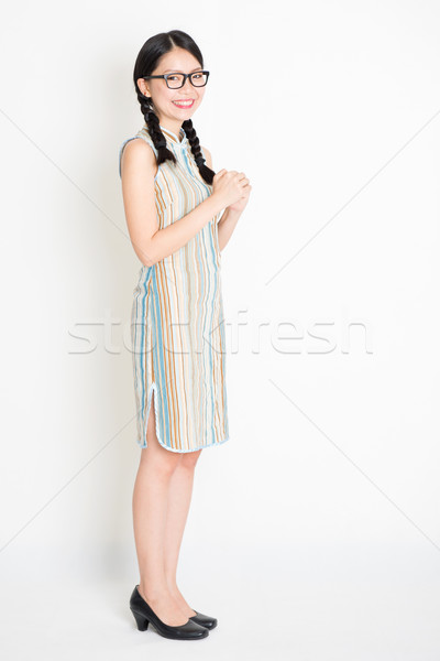 Asian woman greeting Stock photo © szefei