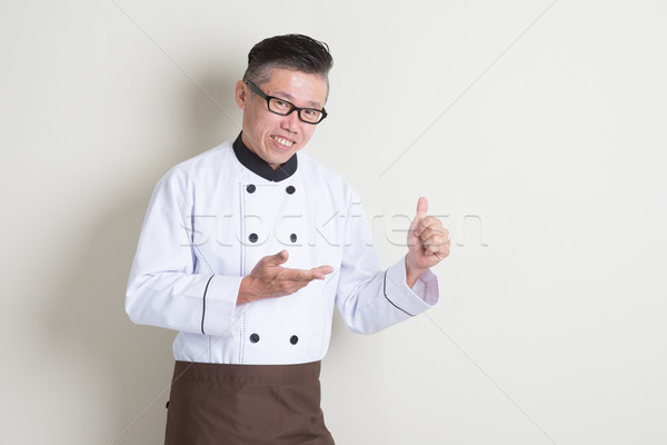 Mature Asian Chinese chef thumb up Stock photo © szefei