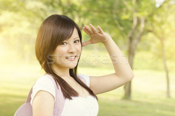 Young Asian college student smiling Stock photo © szefei