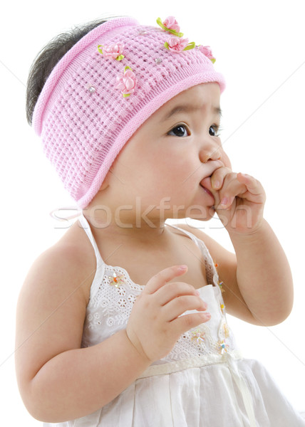 Cute baby girl eating Stock photo © szefei