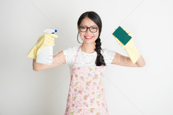 Doing house chores Stock photo © szefei
