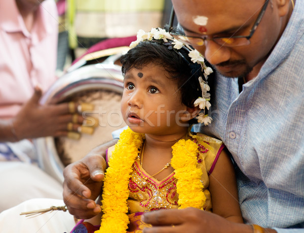 Baby girl received prayers from the karnvedh events. Stock photo © szefei