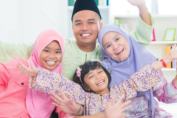 Southeast Asian family quality time at home. Stock photo © szefei