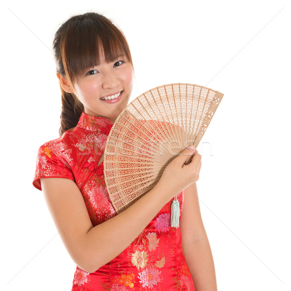 Chinese cheongsam girl with fan Stock photo © szefei