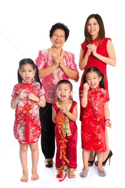 Asian Chinese family greeting on Chinese New Year Stock photo © szefei