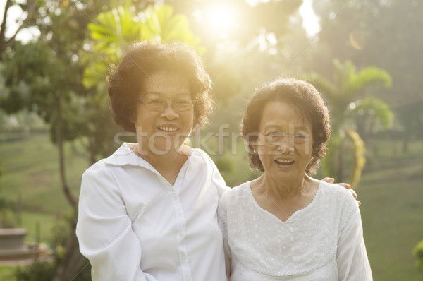 Asian seniors family having fun Stock photo © szefei