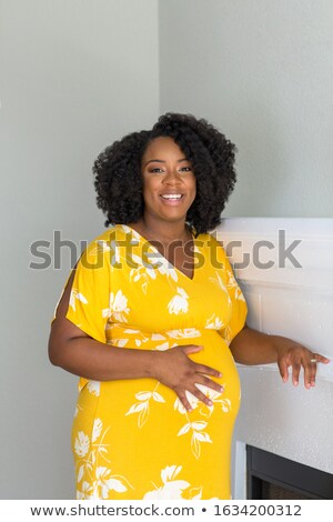 Foto stock: Preagnant African