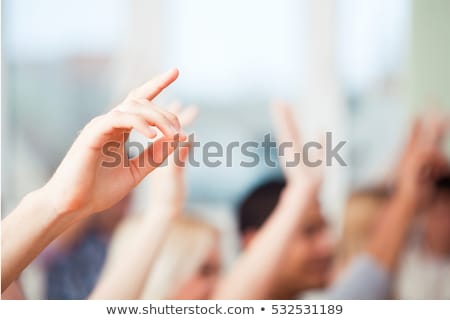 Stok fotoğraf: Raised Hands