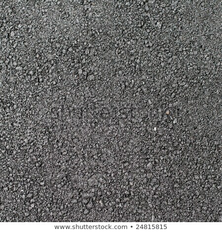 Imagine de stoc: Ou · strălucitor · fundal · de · asfalt · negru · strălucitor