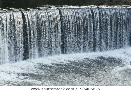 Stock photo: Water Cascade Streaming Down A Lasher