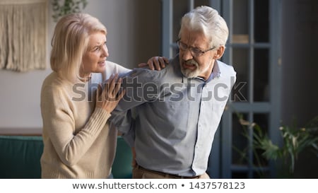 Foto stock: Wife On Husbands Back