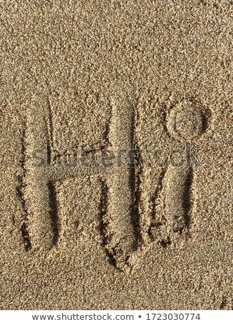 Foto stock: Brown Sand Beach With Written Word Hello