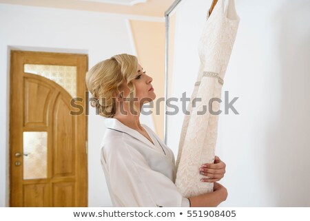 Stockfoto: Blond Woman In Dressing Gown