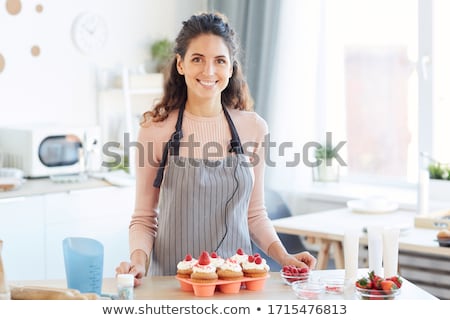 Stok fotoğraf: Young Woman In The Kitchen