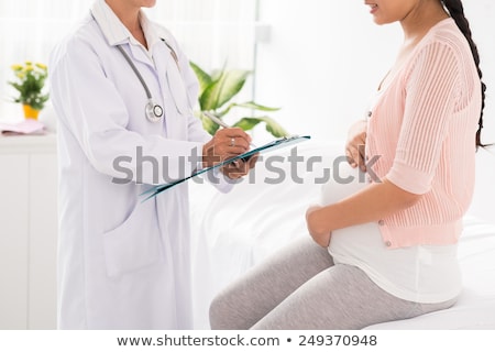 Stock fotó: Pregnant Woman In Doctors Appointment