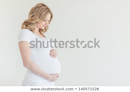 Zdjęcia stock: Motherhood Young Beautiful Pregnant Woman Over White Background