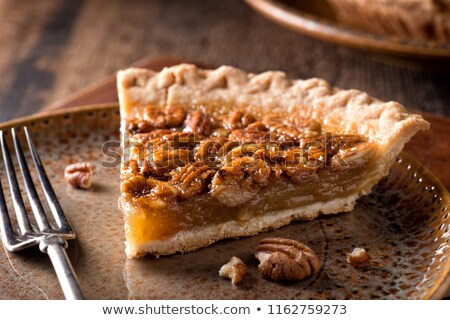 [[stock_photo]]: Pecan Pie Slice And Pecans