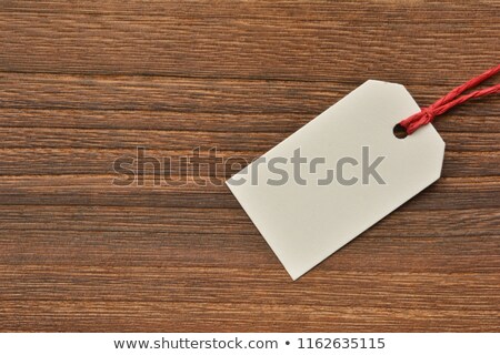 [[stock_photo]]: Vintage Price Tag Label On Wooden Texture Background
