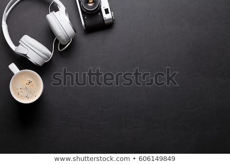 ストックフォト: Office Leather Desk Table With Headphones Camera And Coffee