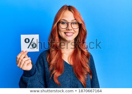 Stock photo: Smiling Business Woman Holding Percent Sign