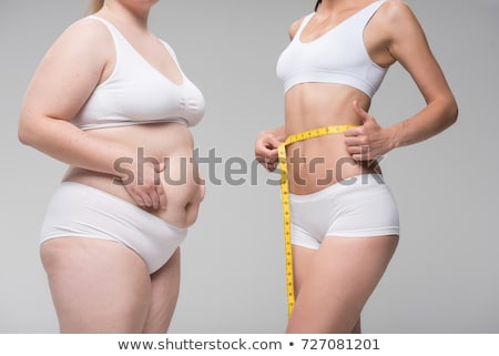 Foto stock: Fat Thin