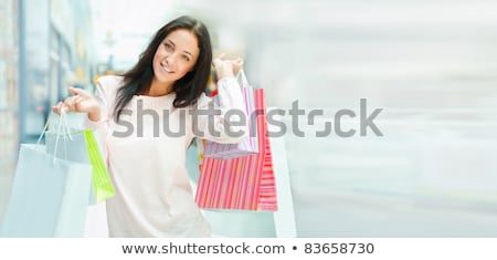 Foto stock: Shopping Woman With Lots Of Bags Smiles Inside Mall She Is Happ