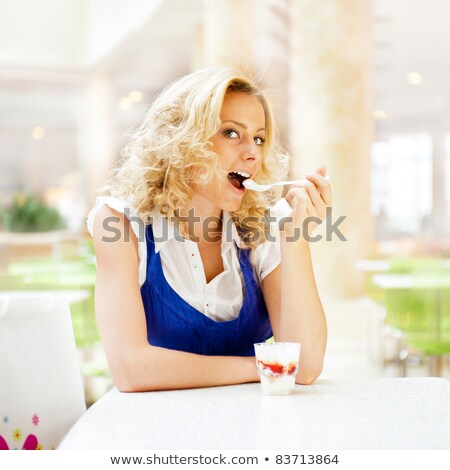 Foto stock: Young Woman Enjoying Coffee Time At Mall Cafe Eating Ice Cream Dessert