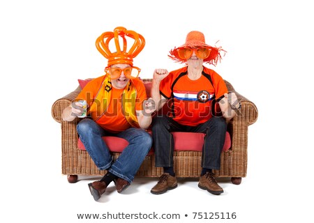 Stockfoto: Two Dutch Soccer Fan Watching Game