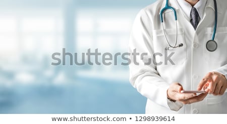 Stock photo: Hospital Medic Using A Cellphone
