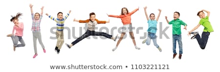 Foto d'archivio: Young Boy Posing On White Background