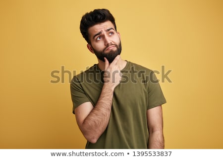 Stock fotó: Casual Man Looking Up Questioningly