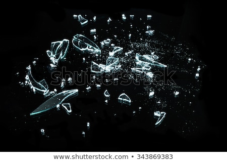 Foto stock: Violence Shattered Pieces Of Glass Over Black