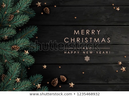 Imagine de stoc: Christmas Tree Branches On Wooden Texture