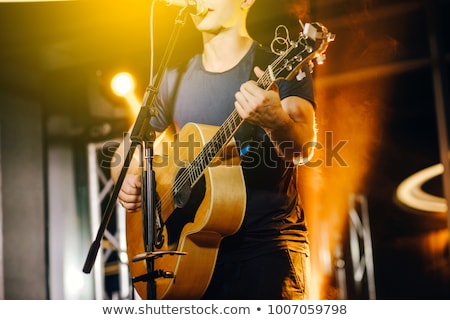 Foto stock: Playing Acoustic Guitar On Stage