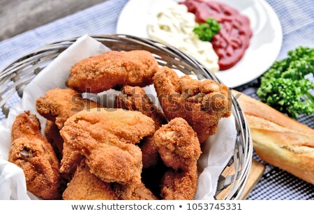 Stok fotoğraf: Barbecue Chicken Wings With Crispy Baguette