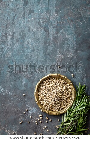 Foto stock: White Pepper And Fresh Rosemary Twigs Culinary Ingredients On Dark Background Copy Space